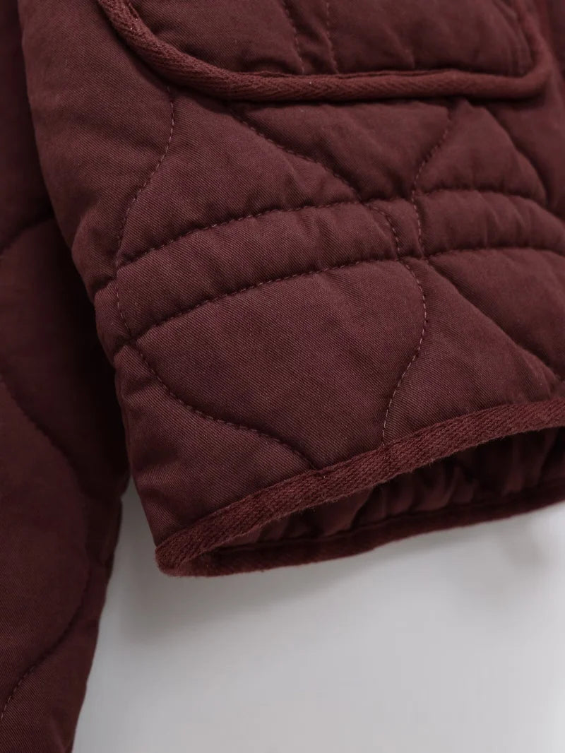 The Quilted High-Collar Jacket
