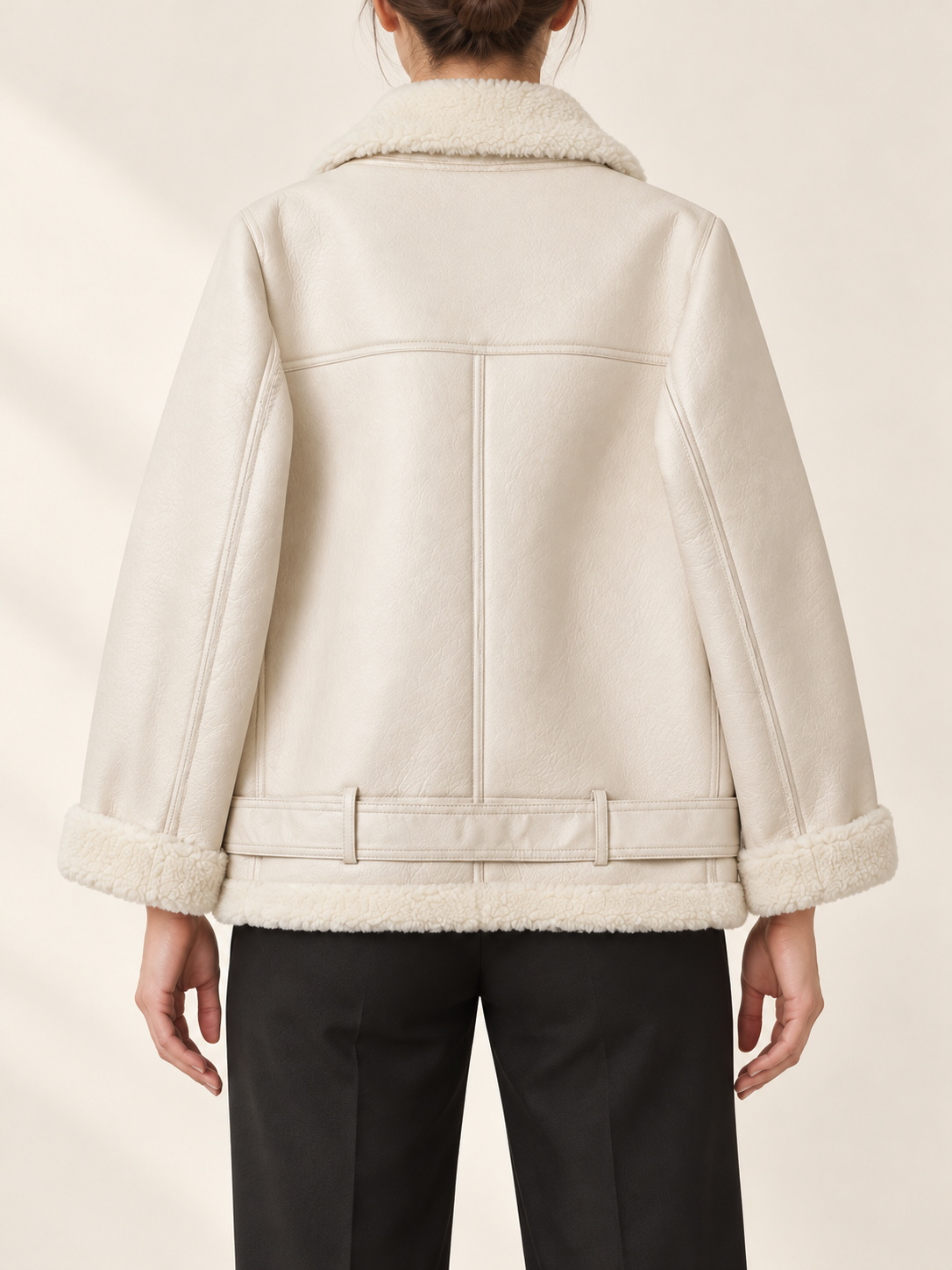 Cream aviator jacket, back view on a model