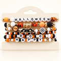 AI-styled studio photograph of the exact Halloween Bat Bead Bracelets — Set of 6; front view.