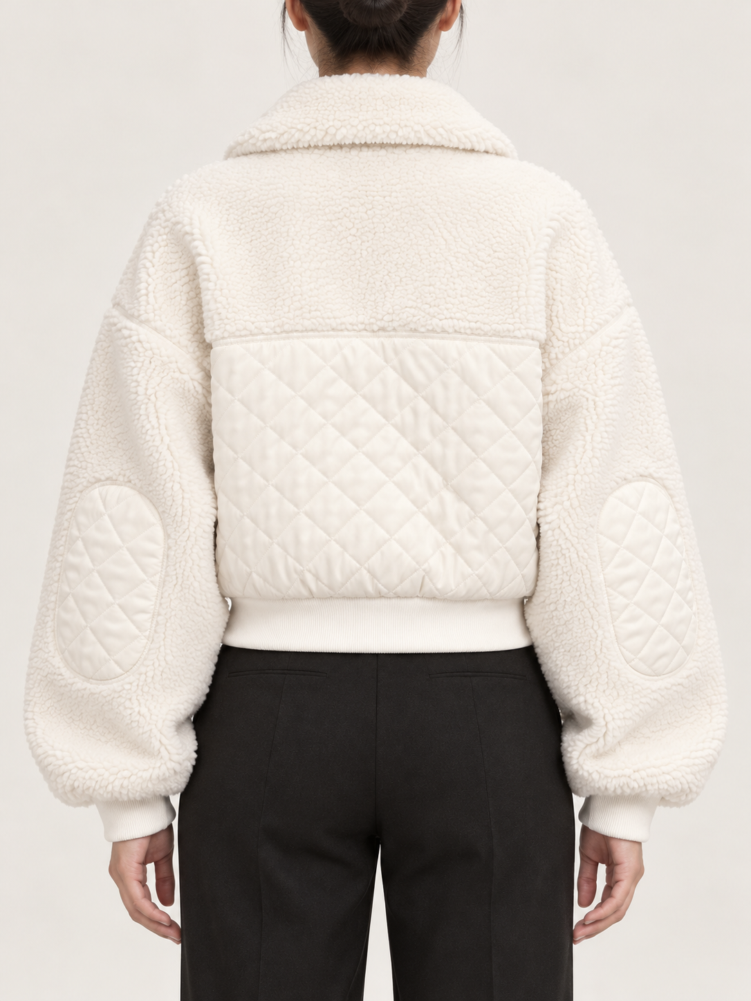 White cropped sherpa jacket, back view on a model