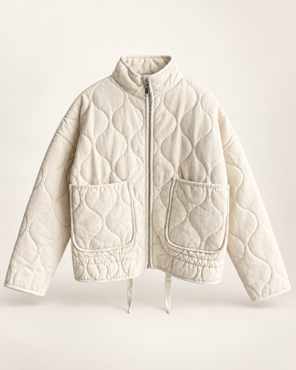 ivory quilted high-collar jacket, front view.