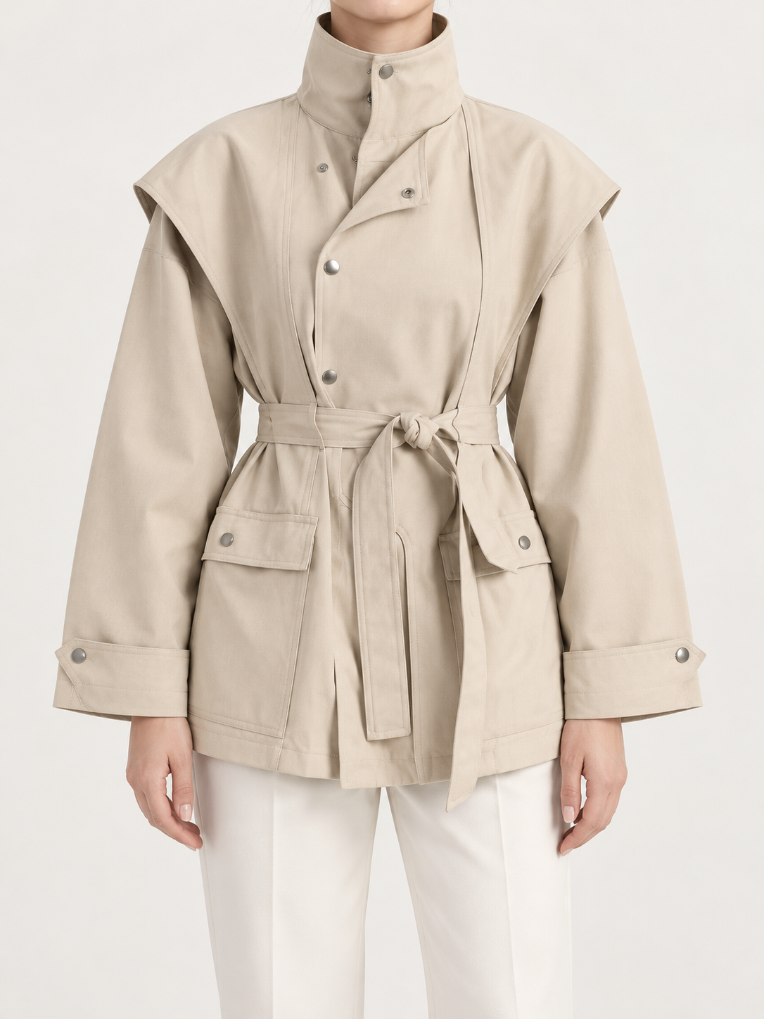 Beige high-collar belted jacket, front view on model
