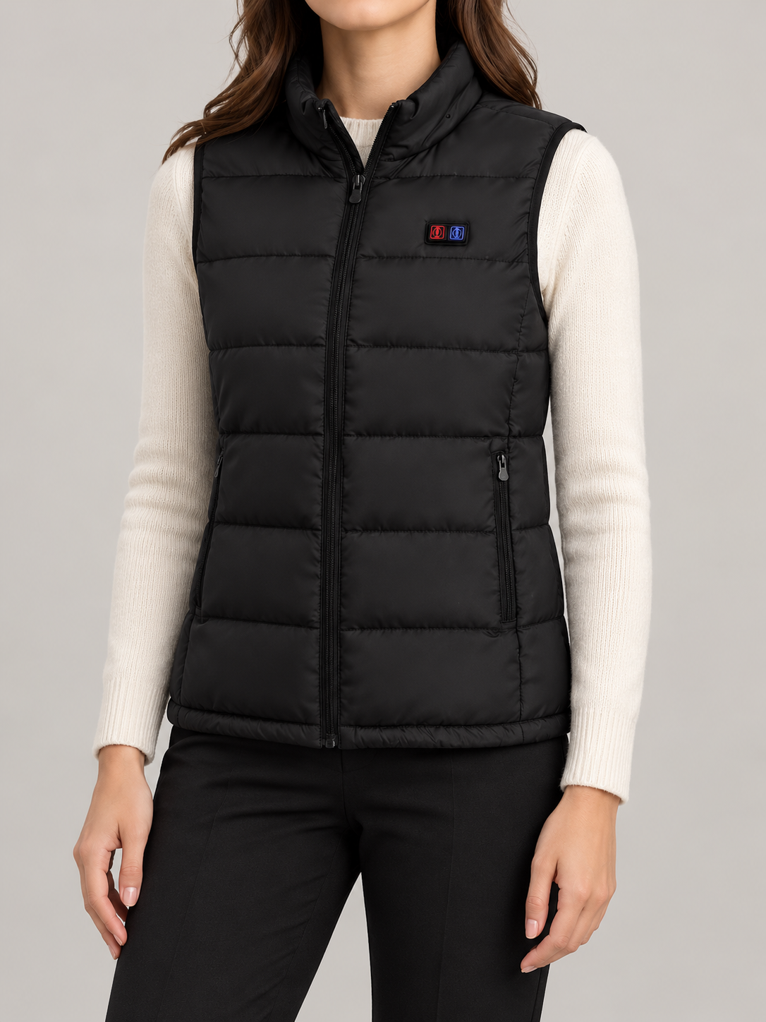 black quilted heated vest with small dual chest control, front view