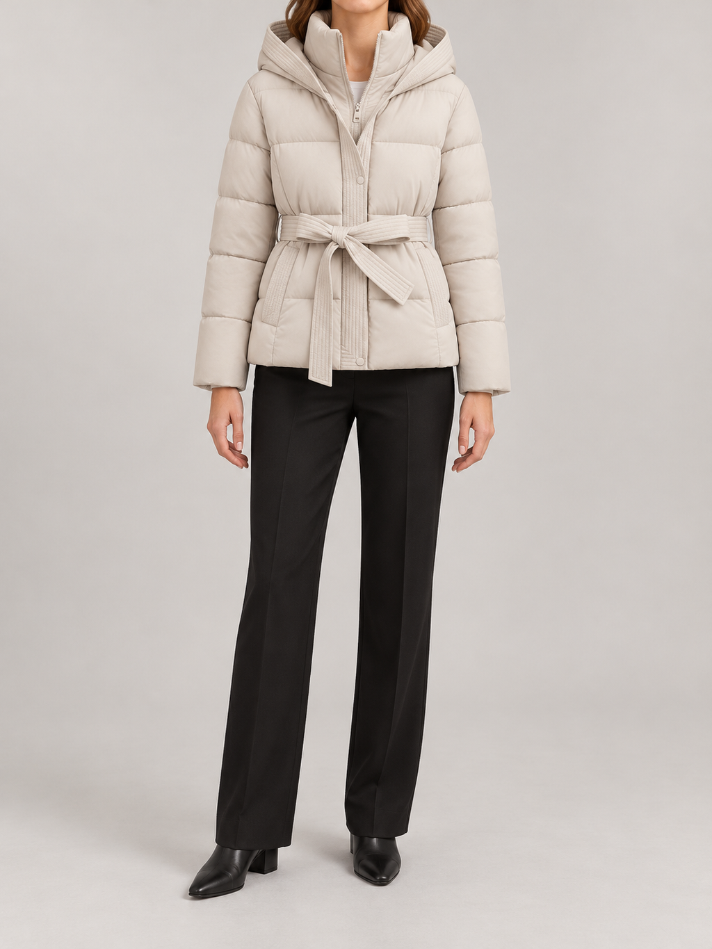 ivory hooded quilted short puffer jacket, upright inner collar, matching waist tie, horizontal padded panels, front view on a model