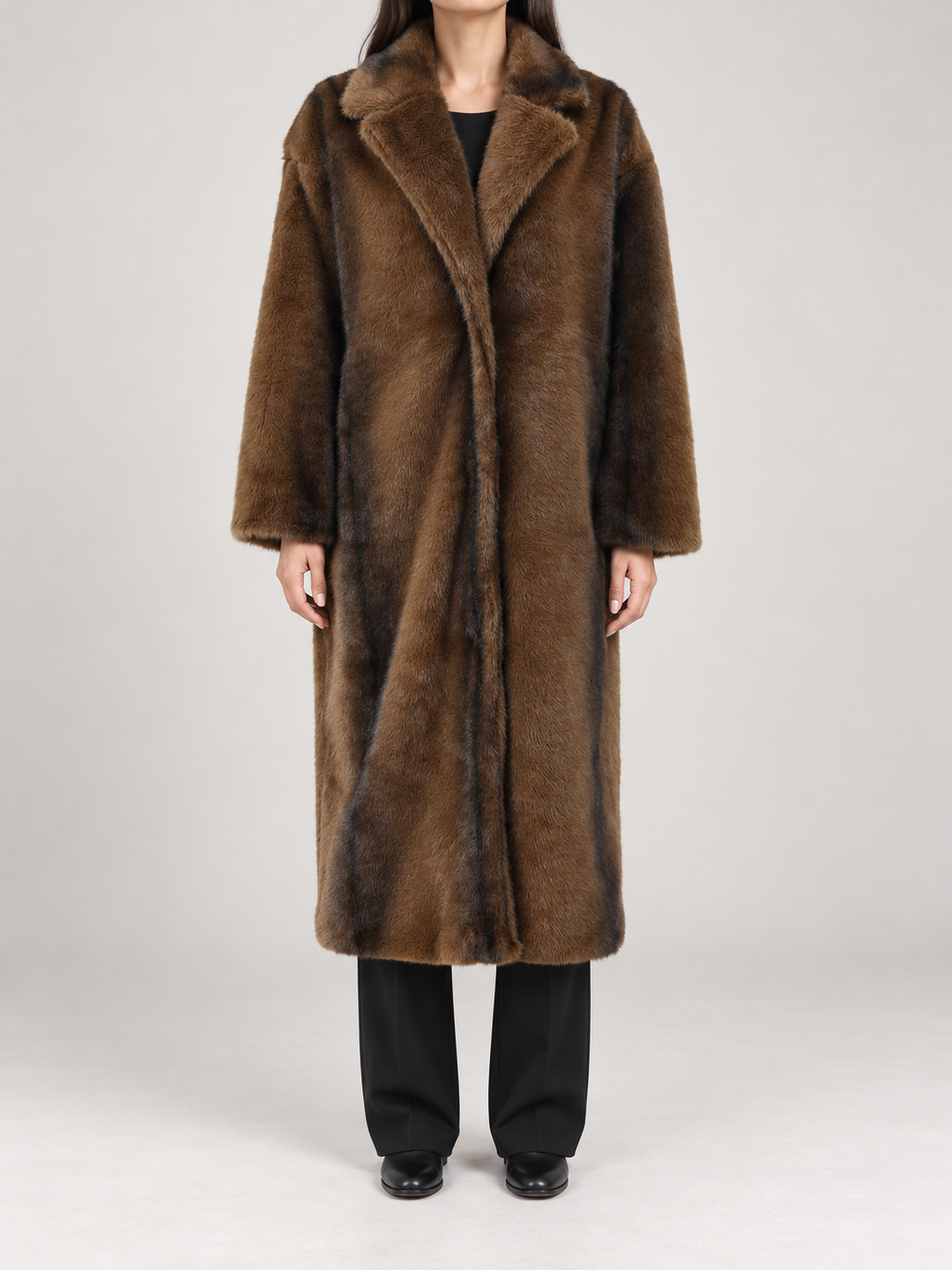 brown long faux-fur lapel coat, exact vertical fur shading, long sleeves and calf-length roomy silhouette, front view on a model