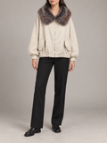 ivory relaxed hooded jacket with multitone brown-grey faux-fur collar trim, gathered hem and patch pockets, front view on a model