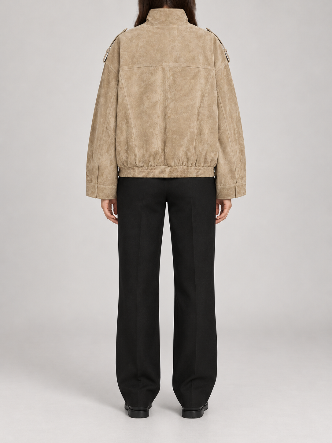 beige suede-touch stand-collar jacket, large flap chest pockets, zip front and elasticated lower hem, back view on a model