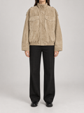 beige suede-touch stand-collar jacket, large flap chest pockets, zip front and elasticated lower hem, front view on a model