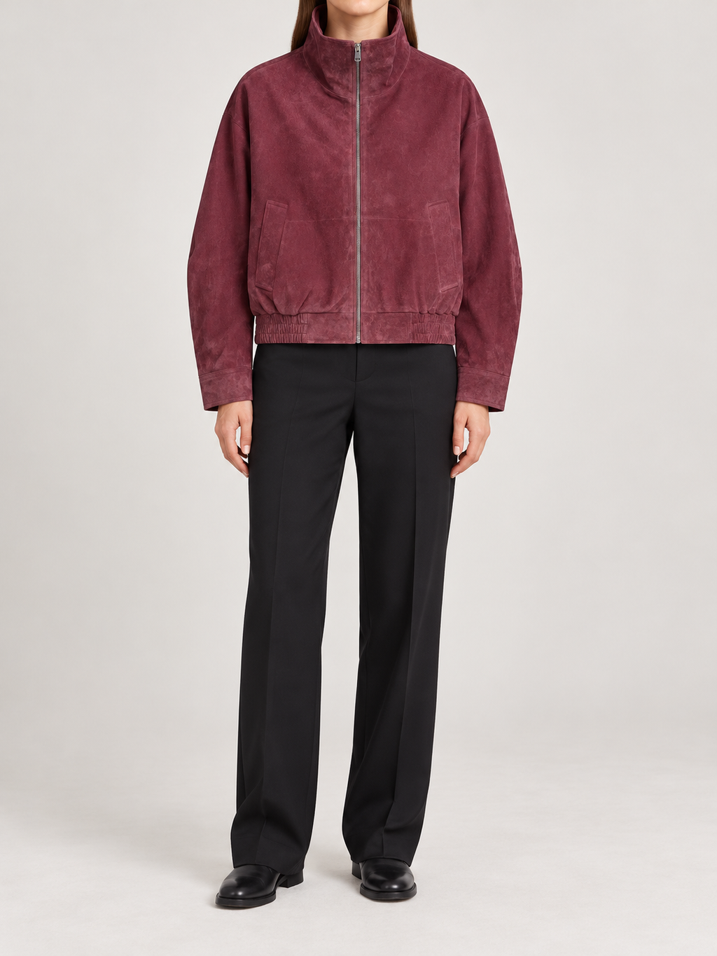wine burgundy suede-touch stand collar zip-front short jacket with elasticated hem, front view on a model