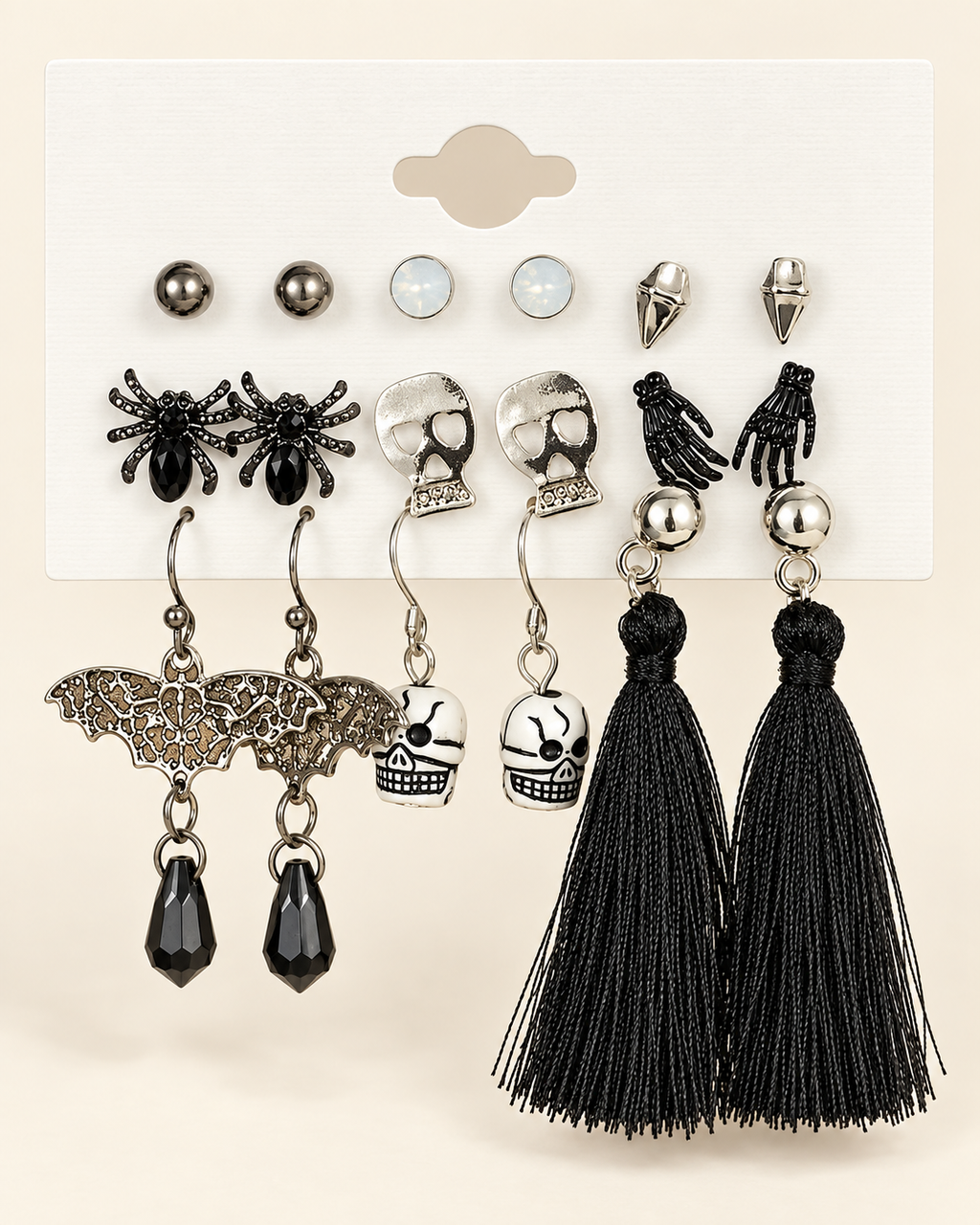 AI-styled front photograph of the nine-pair Halloween earring set on an ivory display card.