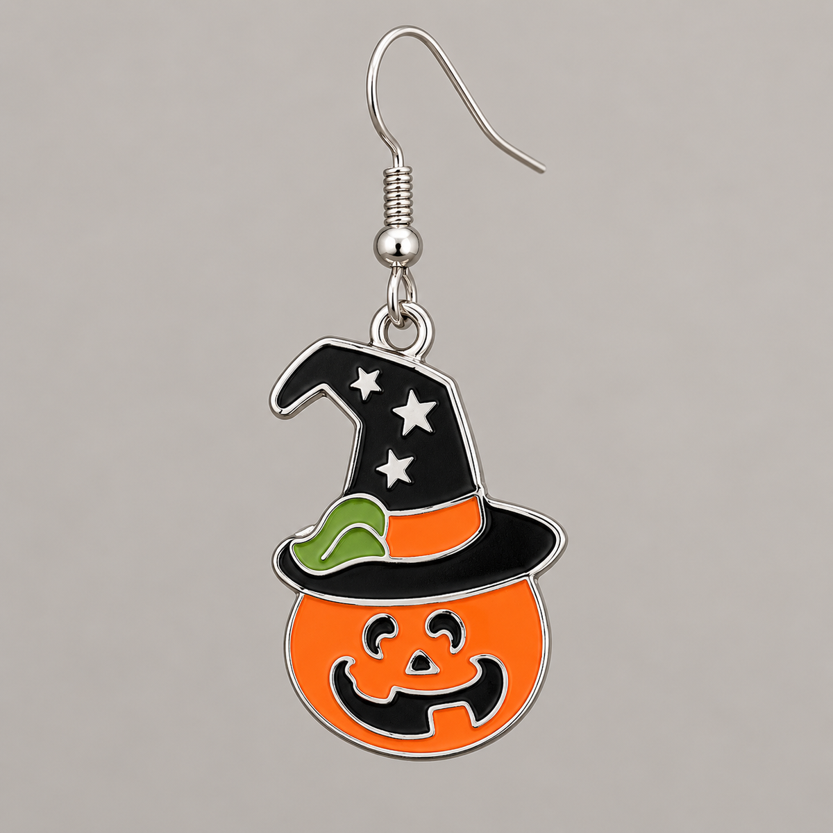 AI-assisted front detail of one pumpkin witch-hat earring; the product is sold as a pair