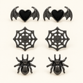 AI-styled studio photograph of the exact Halloween Earrings — 3-Pair Spider, Web & Bat Set; front view.