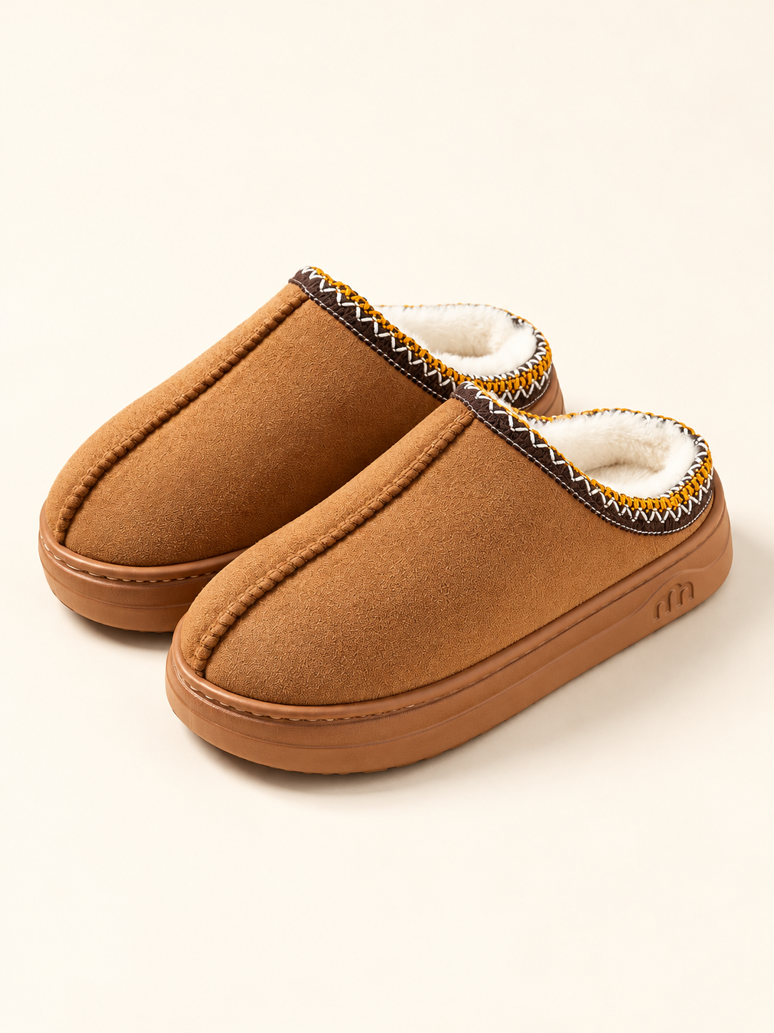 Brown fleece-lined house slippers, three-quarter view