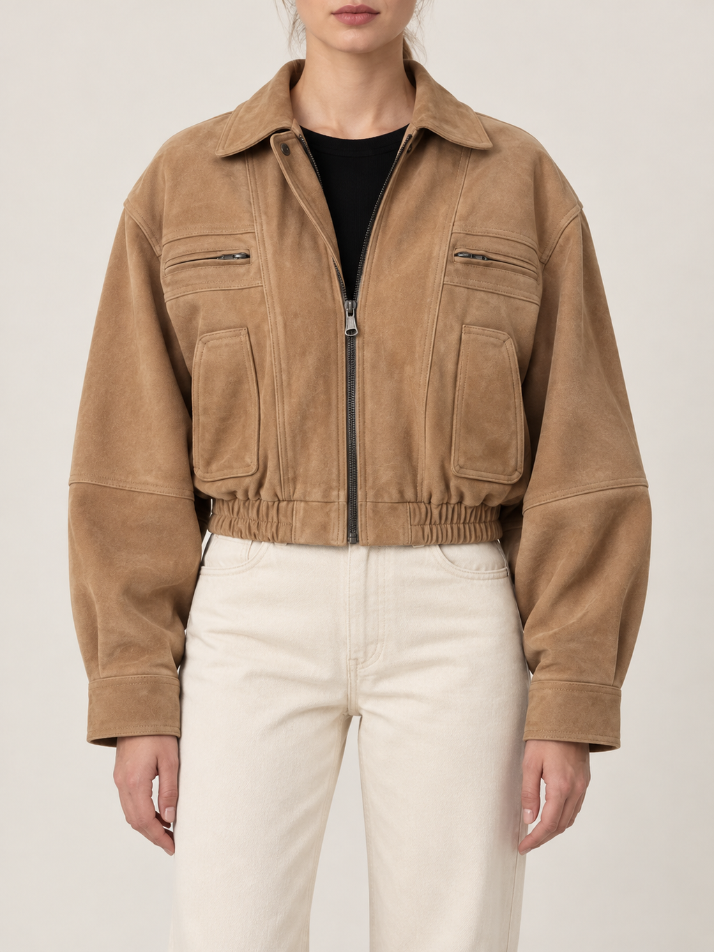 Camel cropped jacket with chest zips and patch pockets, front view on model